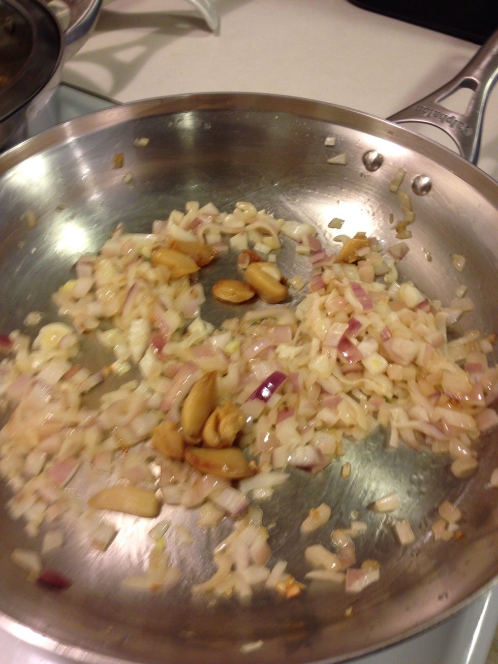 Toss in the garlic! It will pretty much melt as you cook it! NOTE: you can use raw garlic, just use about 1/2 the amount