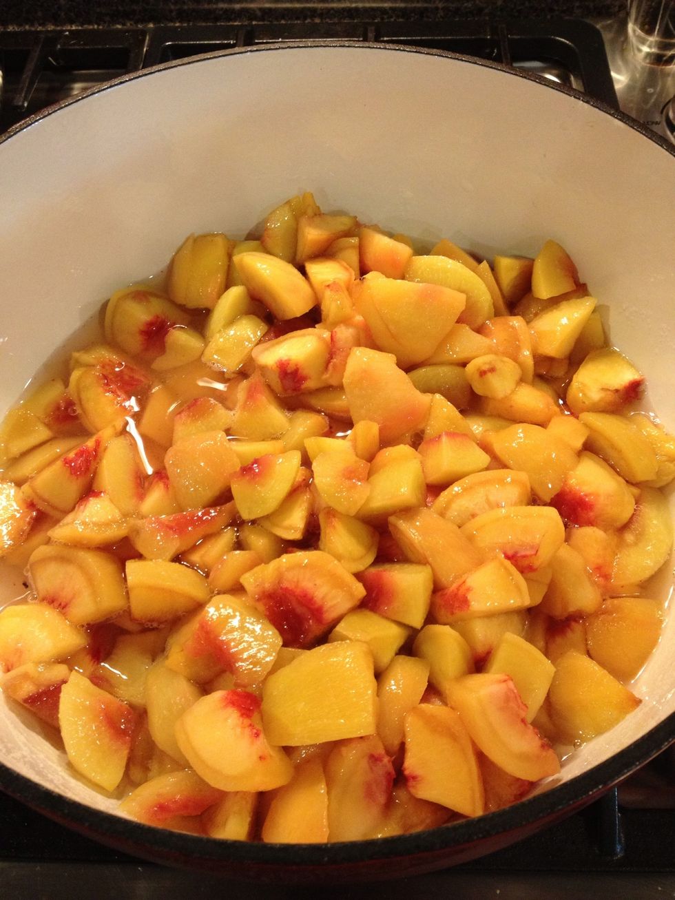 Toss into a large pot. Add 1 cup of water and 2 cups of sugar.