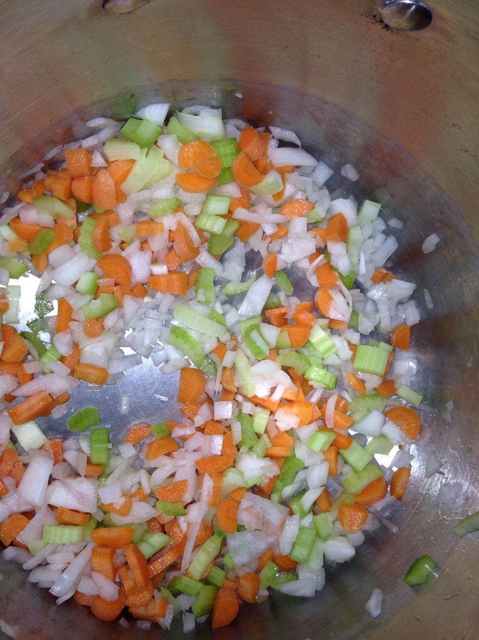 Toss into the pot and put heat on medium. Let them cook while you peel and chop potatoes.