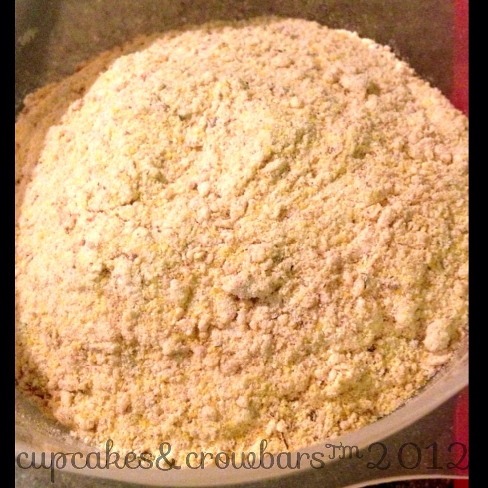 Toss it into the bowl where you've mixed the cornmeal, basil (missing from this photo), cayenne, and pepper.