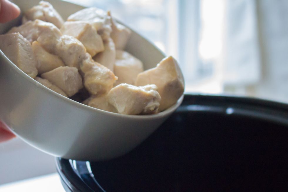 Toss the cooked chicken into the crockpot.