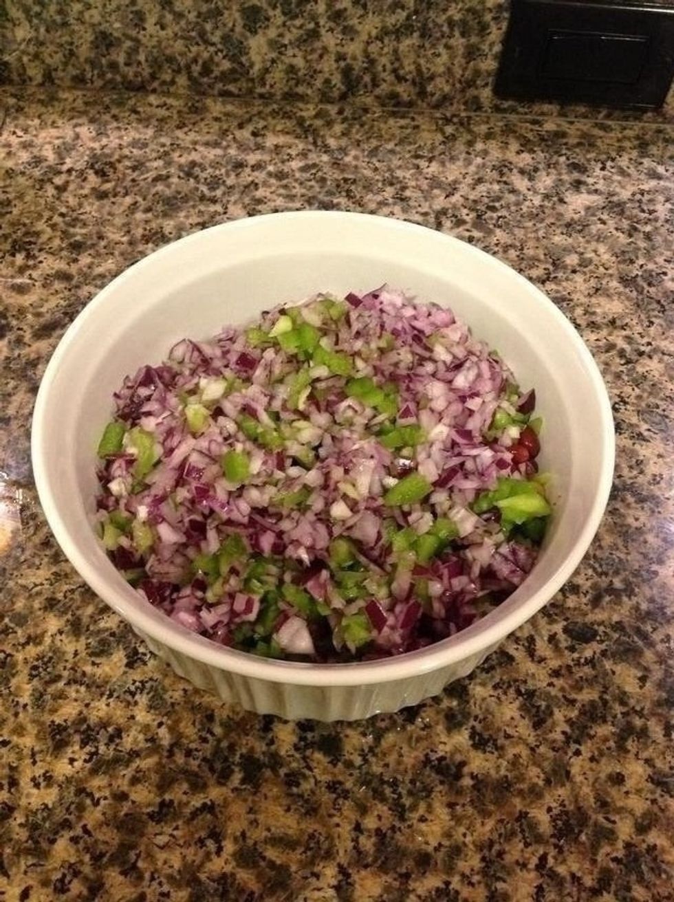Toss the green pepper and onion in the bowl.