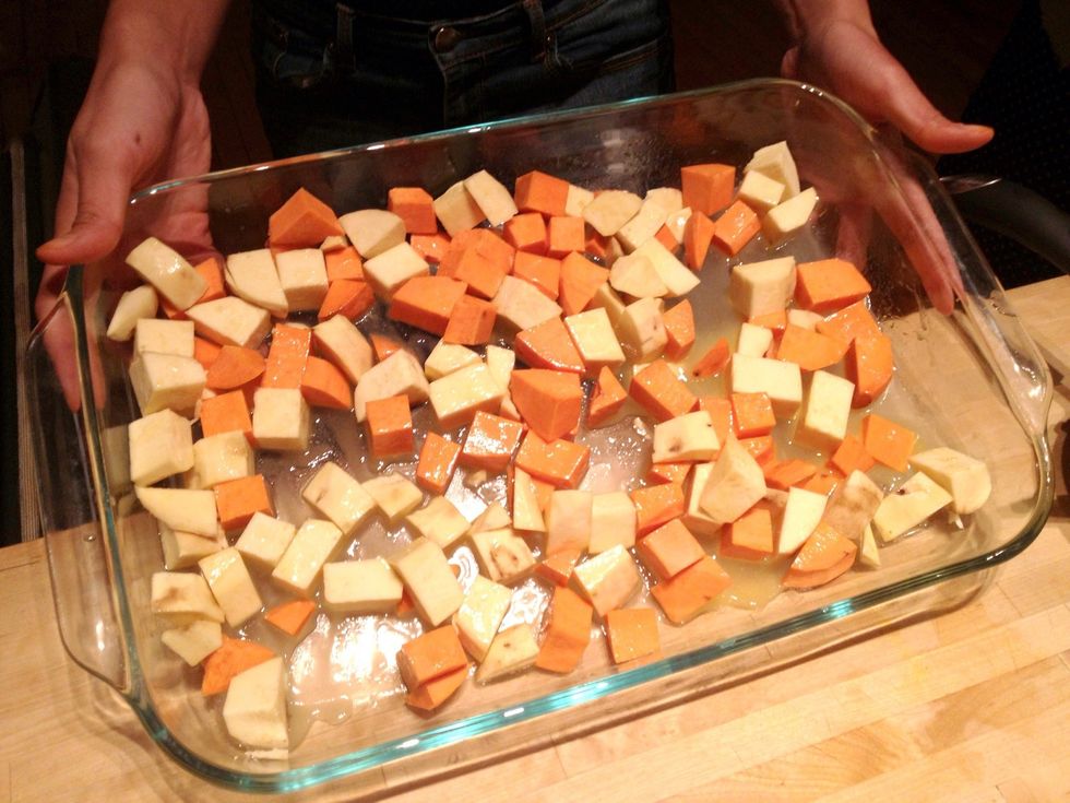 Toss the potatoes so that they're evenly coated with the syrup. Bake them in the oven for 60 minutes. Stir them once or twice during the roasting.