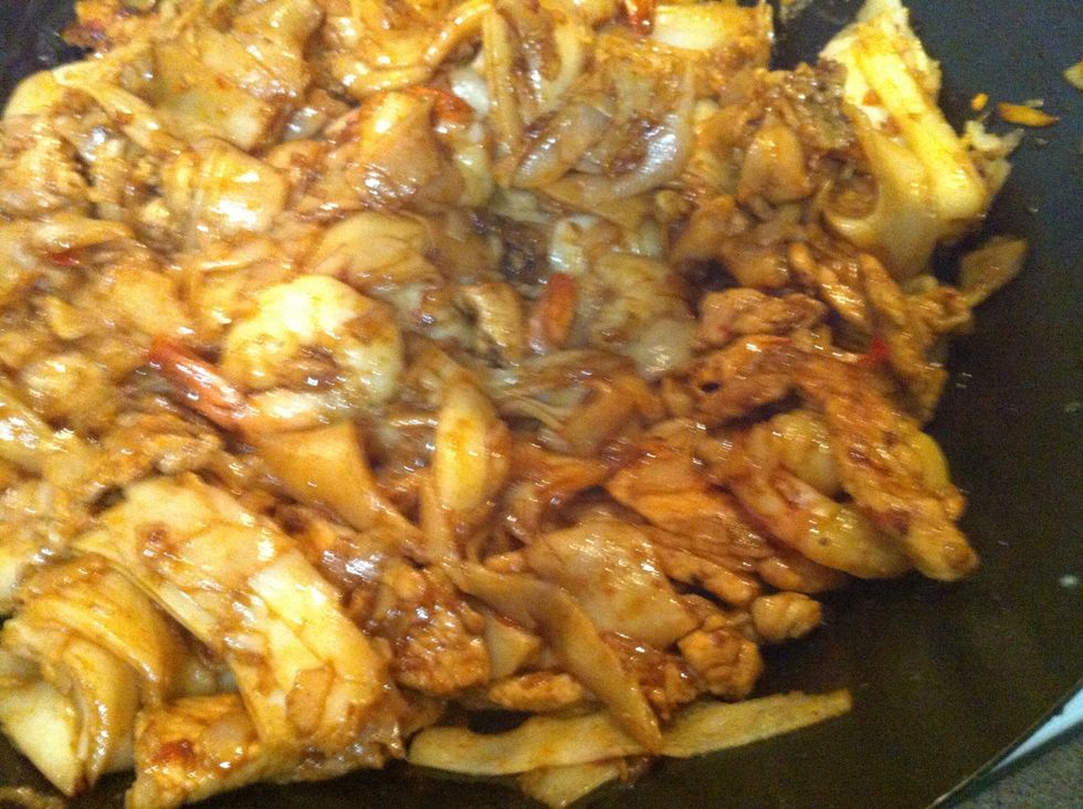 Toss them to heat through. Scrape the bottom of wok or pot frequently to minimize sticking