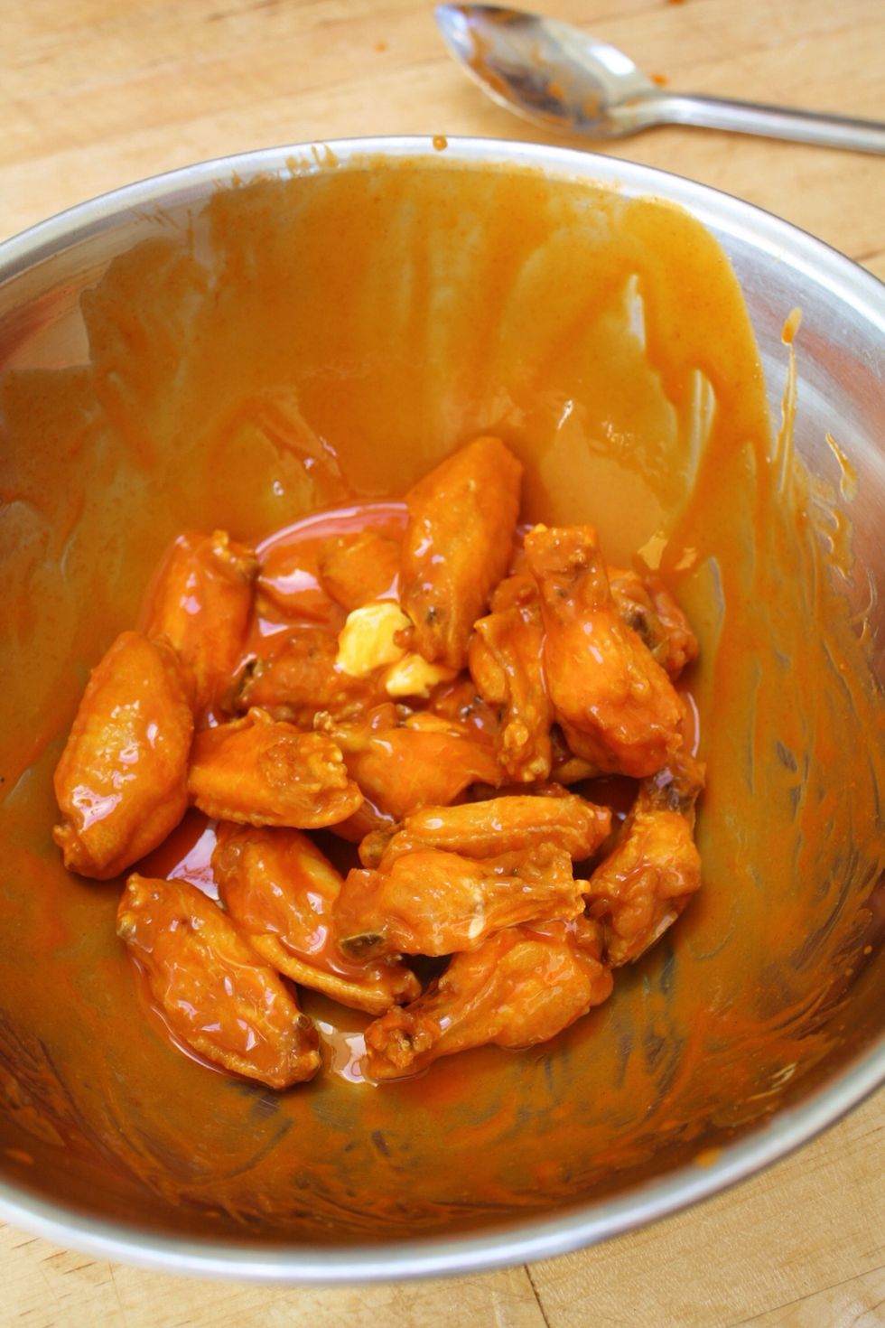 Toss to coat. The butter will melt and create a delicious, rich coating with the hot sauce.