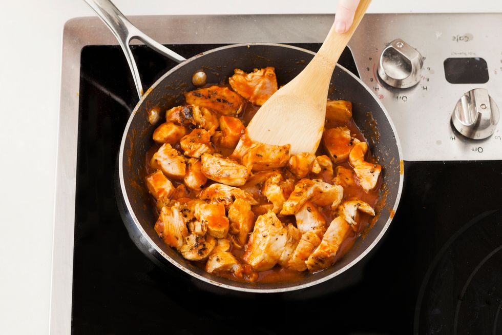Toss to thoroughly coat each piece of chicken.