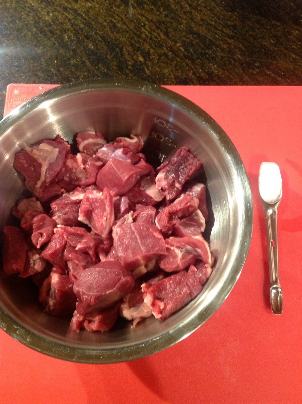 Toss trimmed and cubed lamb with salt