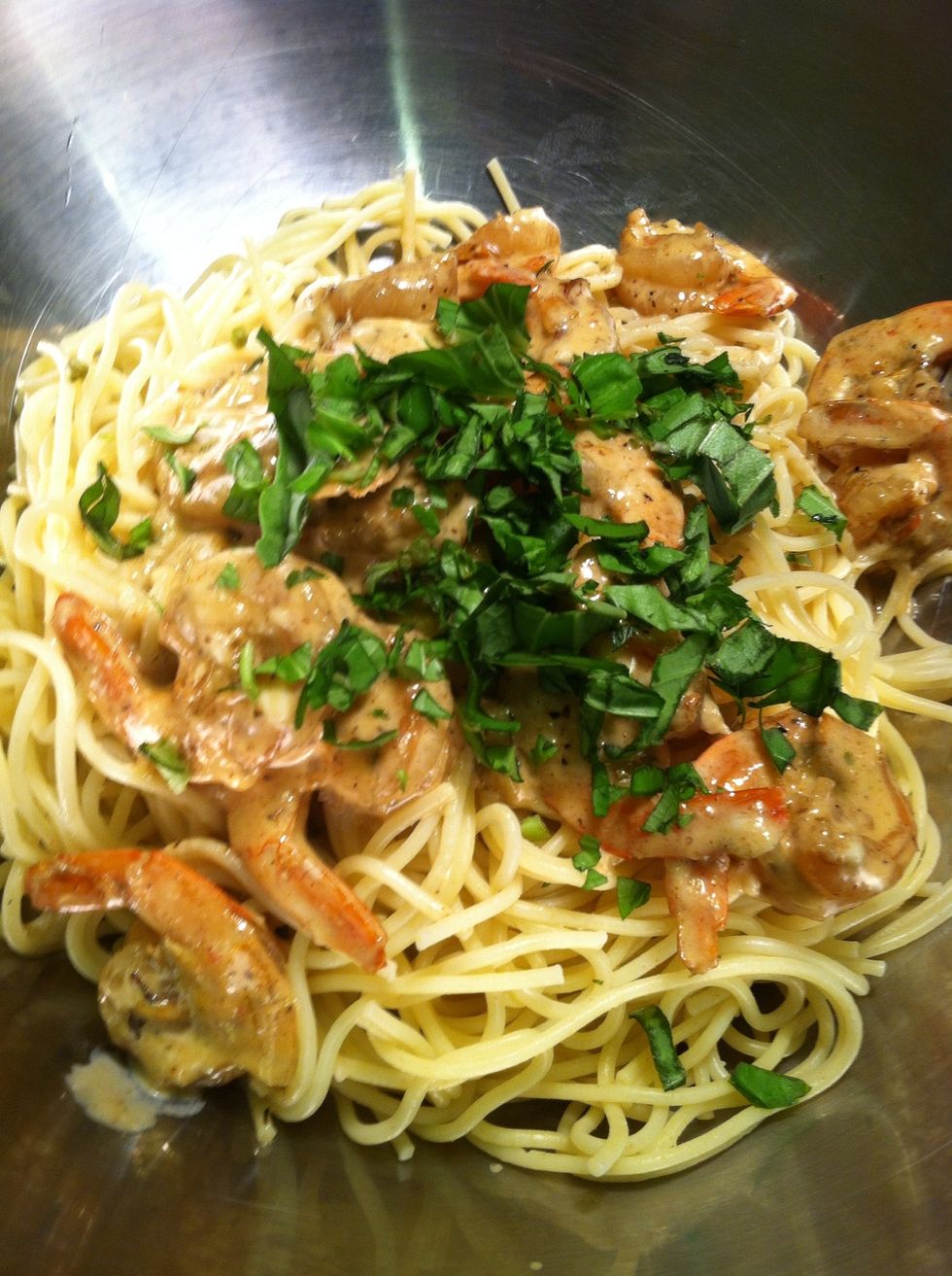 Tosses with chopped fresh basil