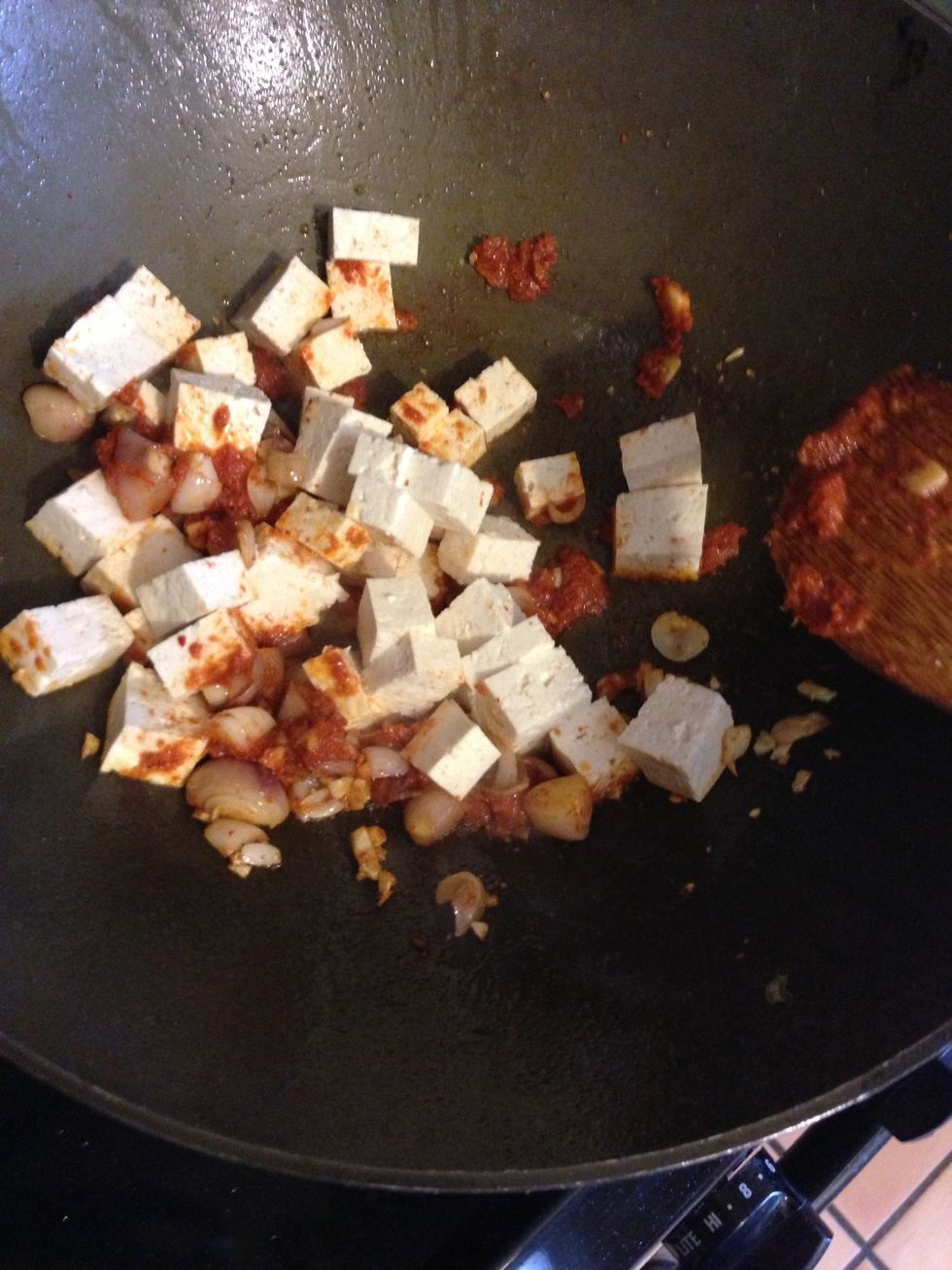 Tossing some tofu.