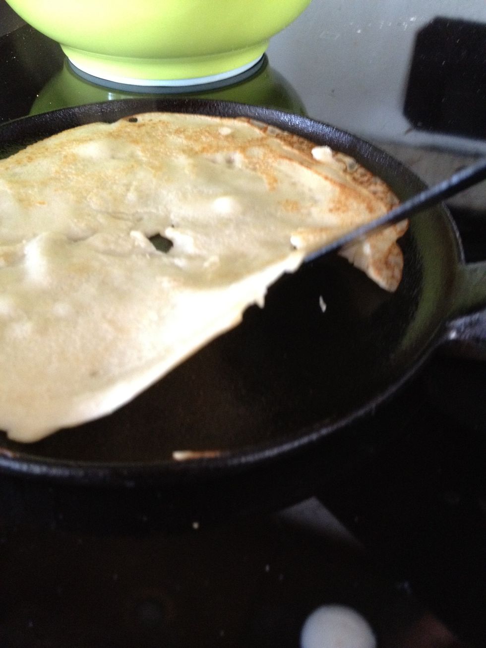 Touch around the sides to avoid the pancake from sticking
