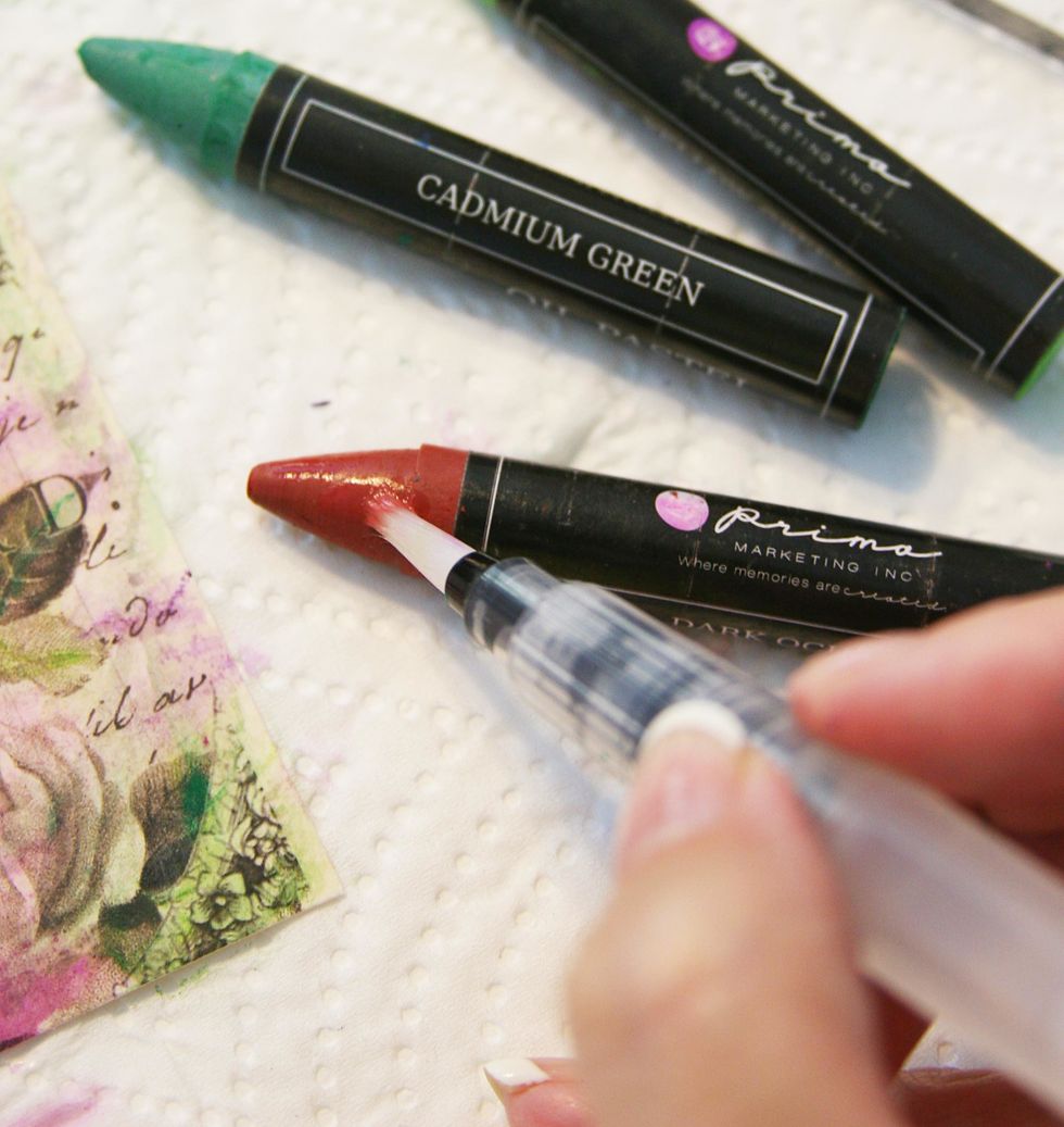 Touch the waterbrush directly to the Oil Pastel tip to get bold, beautiful color. (This is Dark Ochre, which adds great shading.)