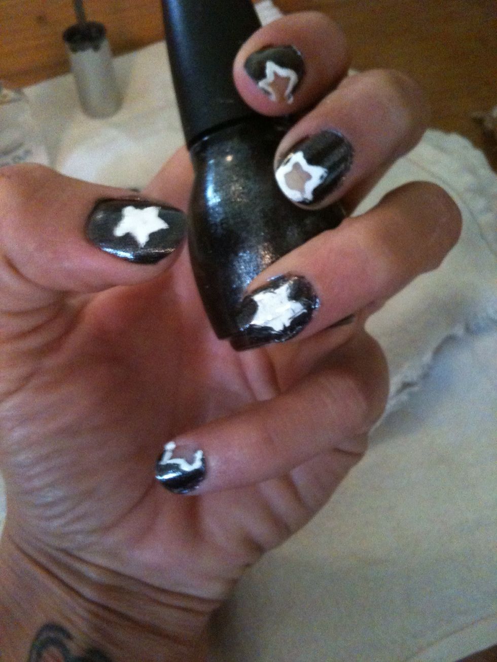 Touch up spots on skin with q-tip ( not pictured, I still need to complete that one) and nail polish remover, touch up stars with toothpicks and polish. Apply top coat and Waa Laa!