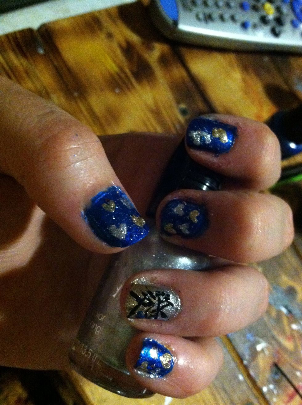 Touch up with a q-tip and remover and then top coat and you're done!
