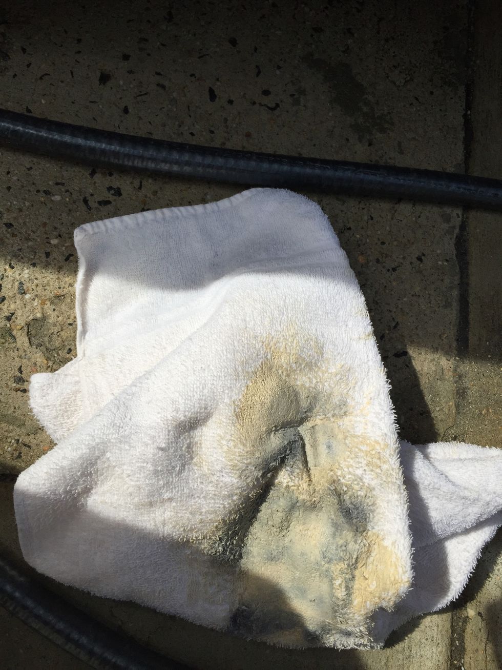 Towel used to apply Rubbing Compound and remove scratches