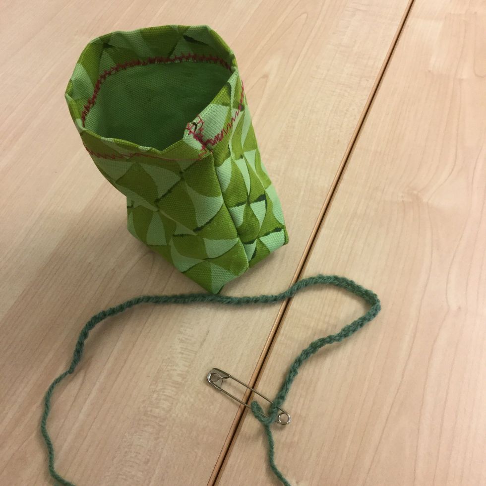 Tr\u00e4 upp din f\u00e4rdiga snodd p\u00e5 en s\u00e4kerhetsn\u00e5l.