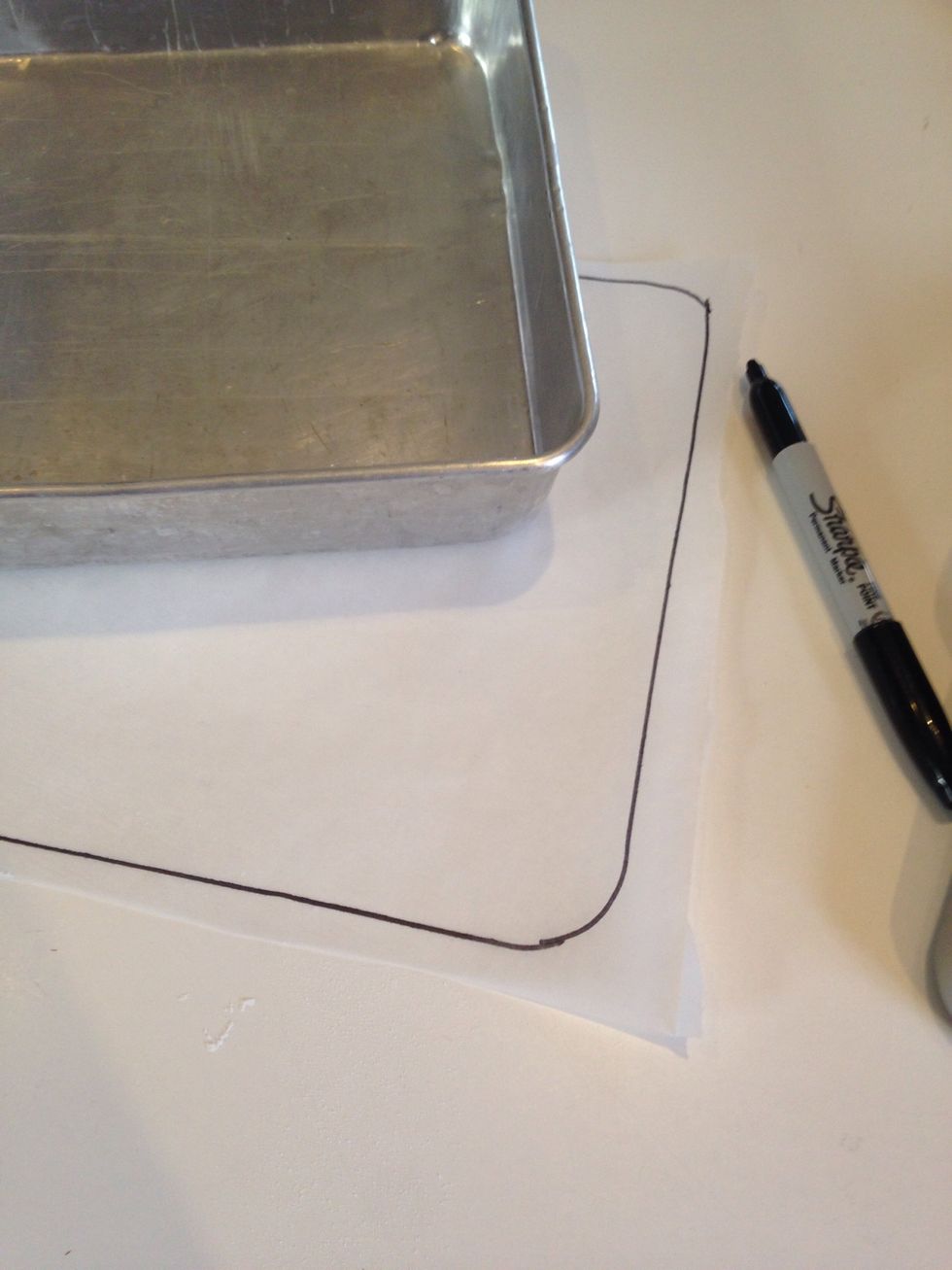 Trace a 9" round or square cake pan on parchment paper. Cut inside the line you drew.