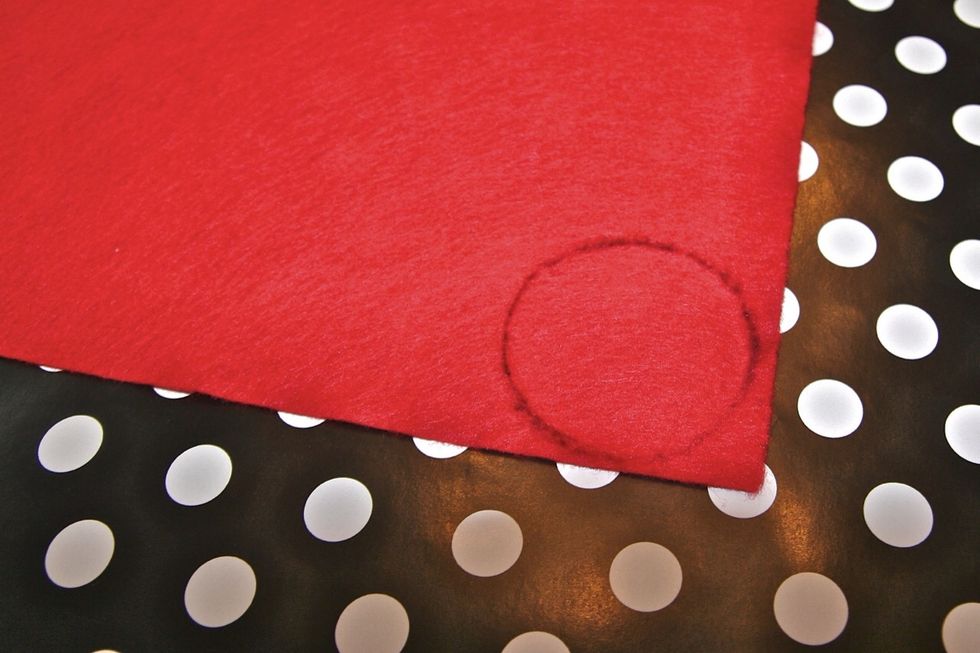 Trace a circle on the FELT fabric the size you want your flower to be (I traced mine off a glass cup)