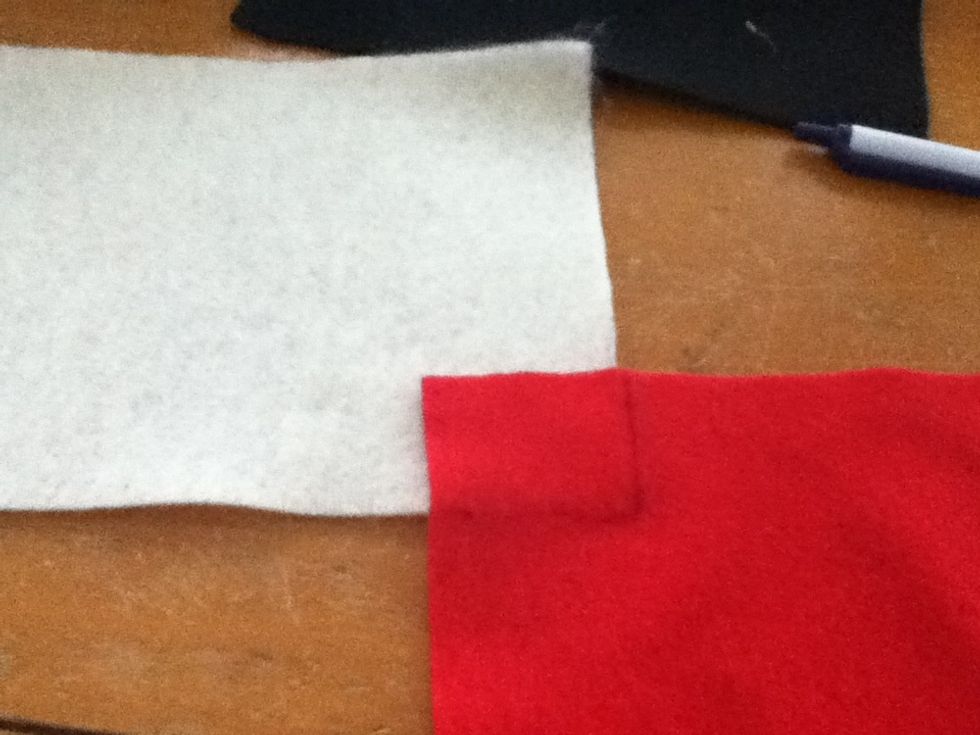 Trace a red let square on the corner of the flesh colored, then cut it out.