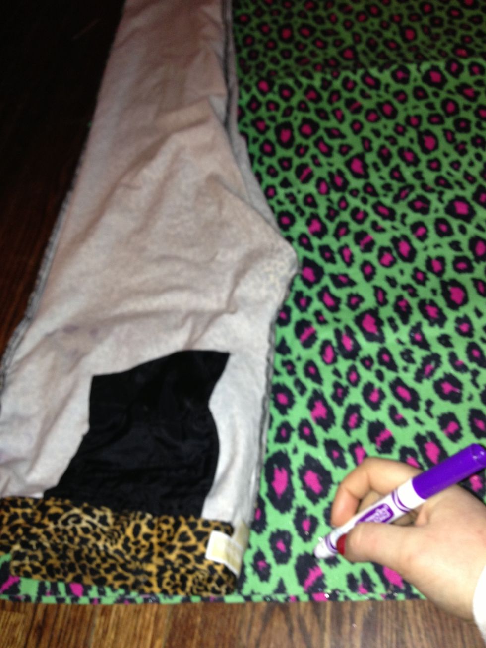 Trace about 2" away from the waist to the crotch area. Once at the crotch, draw straight to the ankle.