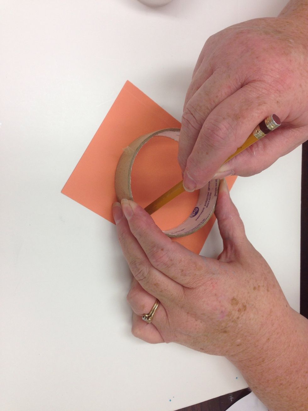 Trace an object that is close to 3 inches for your sun.