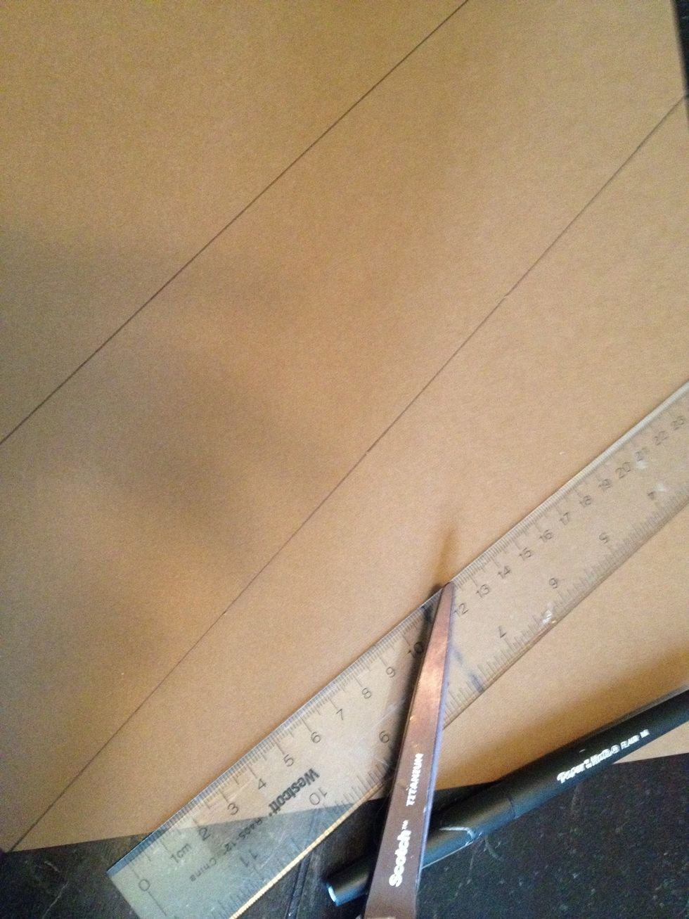 trace and cut a basic rectangle for the shaft of the shovel using your ruler. make sure it's size porportionate to the blade.