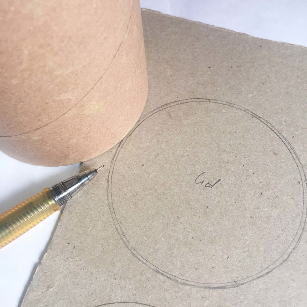 Trace another one out just as Step 2. Draw an outer circle around it (about the thickness of the toilet roll, ~1/16"). This will be the top of the lid of the jar.