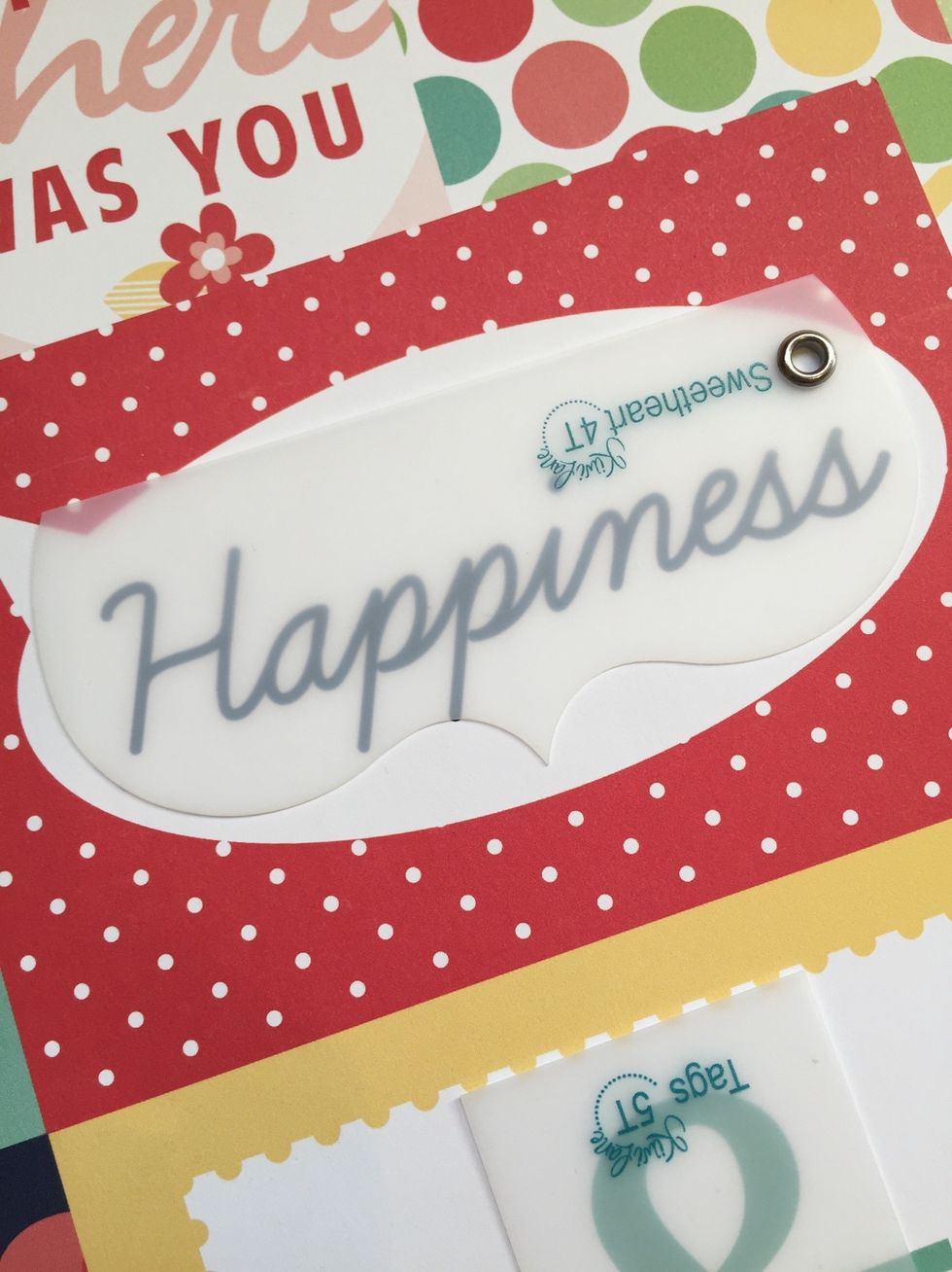 Trace around the elements in your paper to incorporate them into the design of your card.