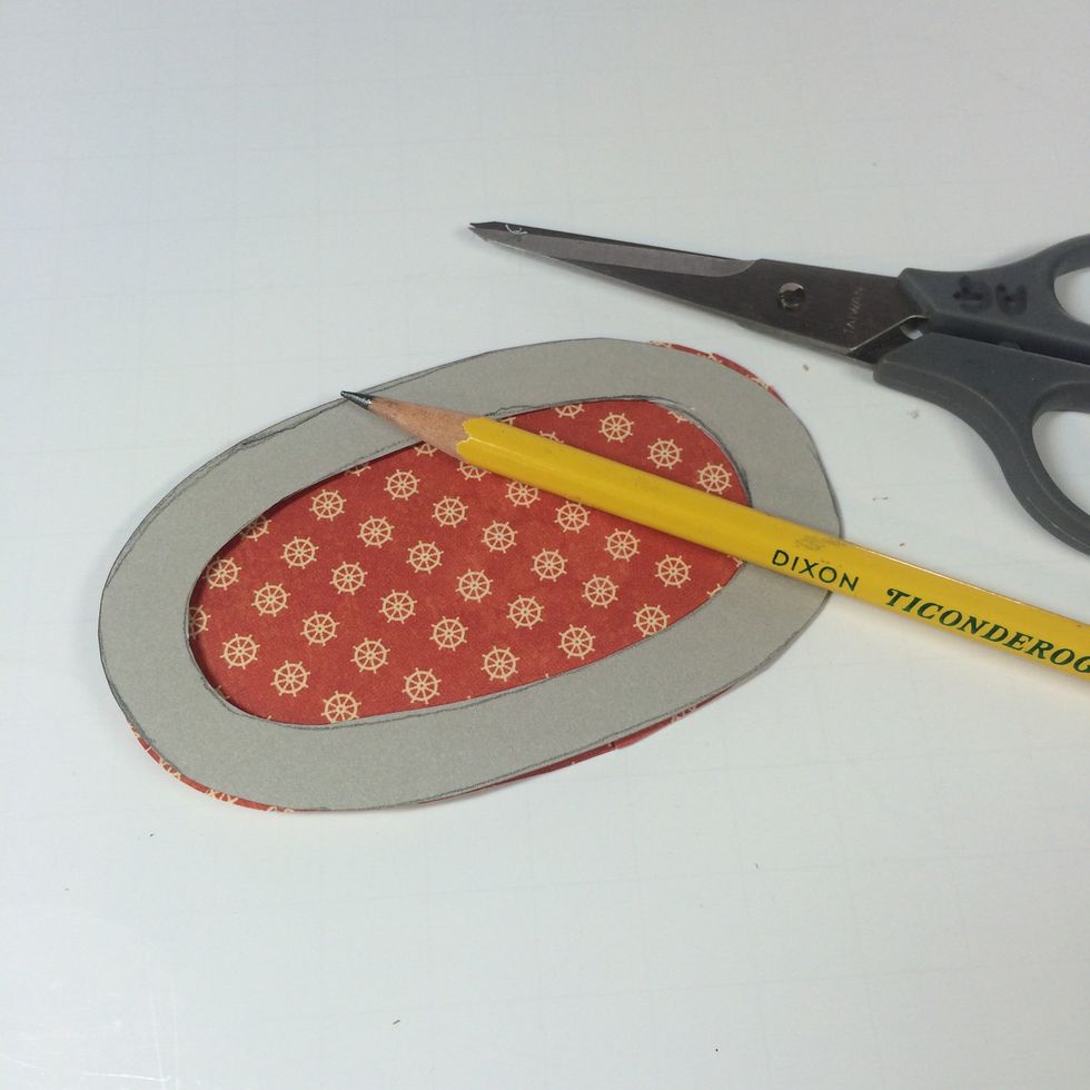 Trace just the outer oval onto desired pattern paper. Cut out.