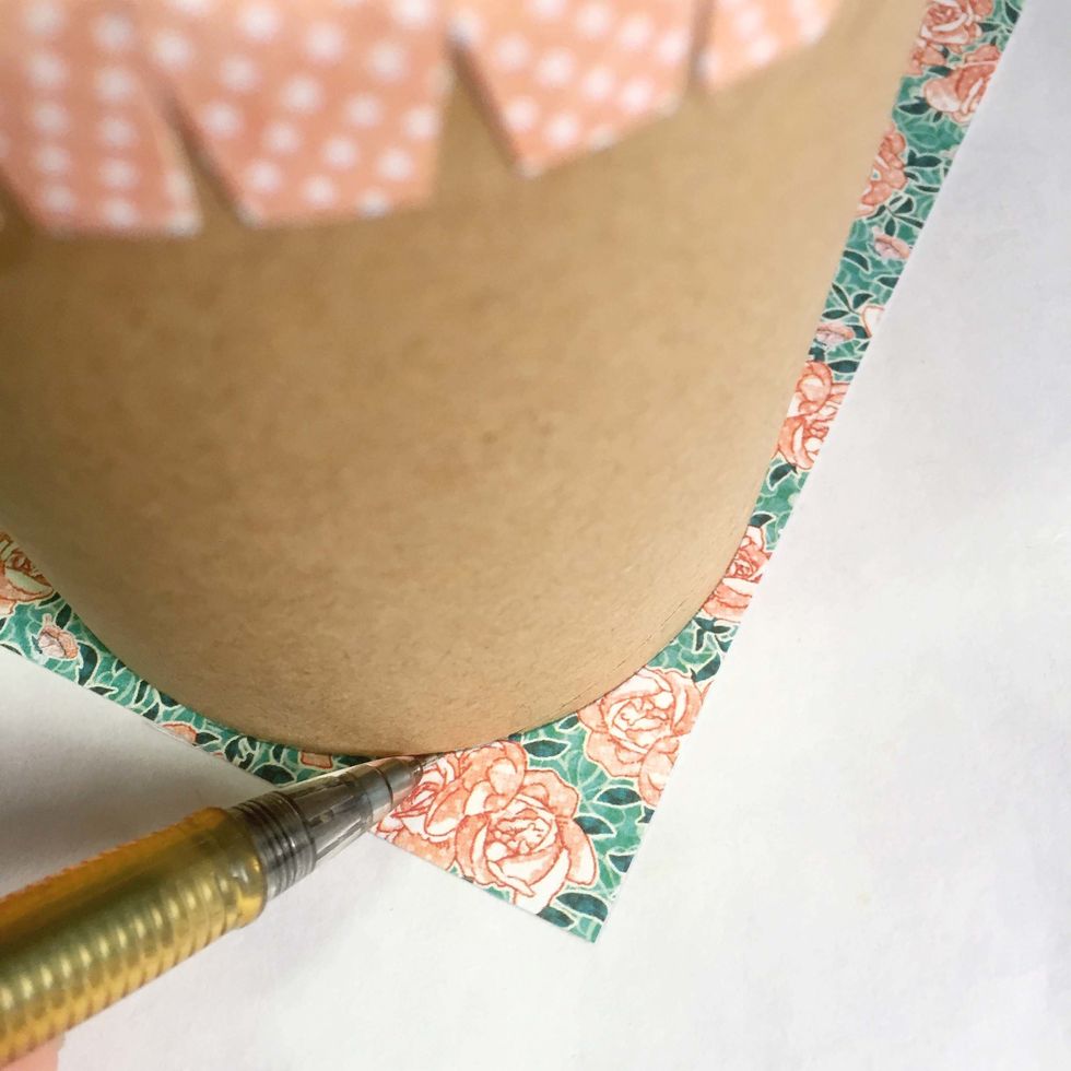 Trace out another base onto another pattern paper of your choice using a mechanical pencil.