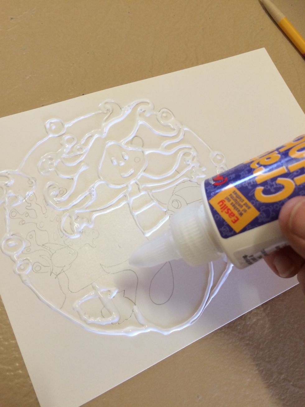 Trace over lines with glue making sure it's a thick line.