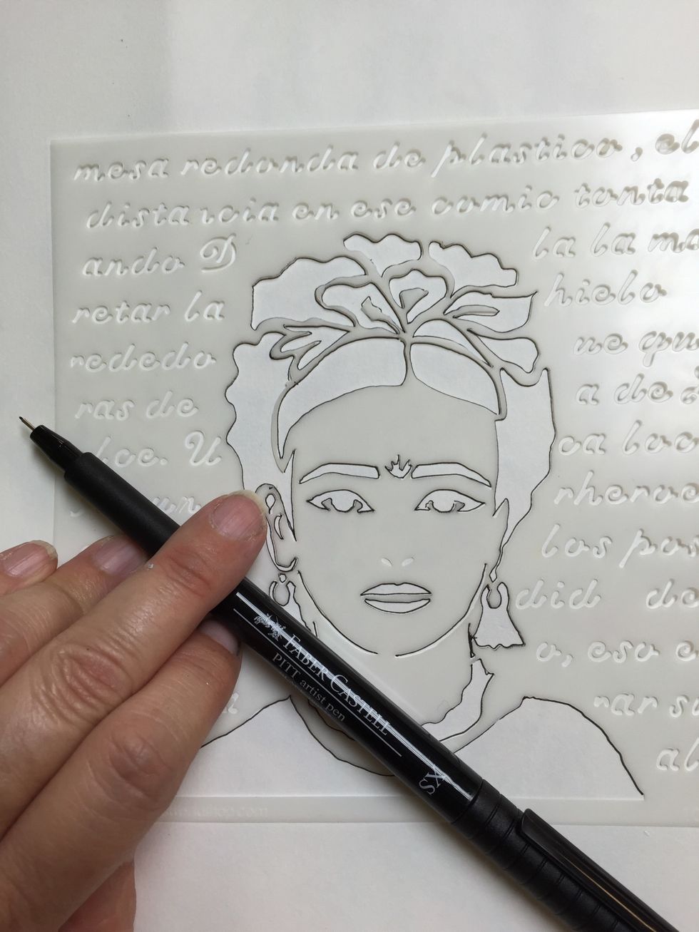 Trace over your stencil using a waterproof pen