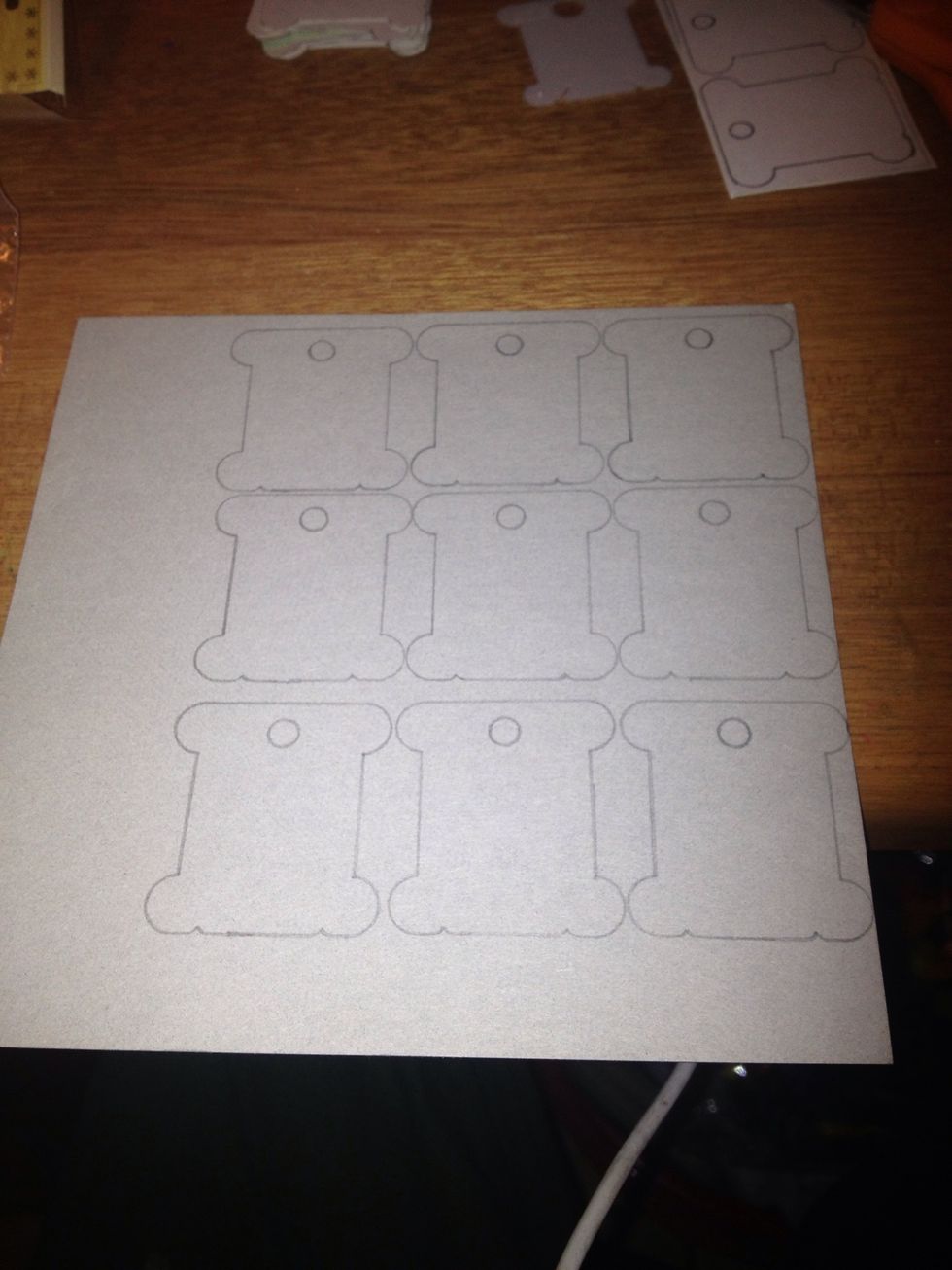 Trace the bobbins on a piece of cardboard.