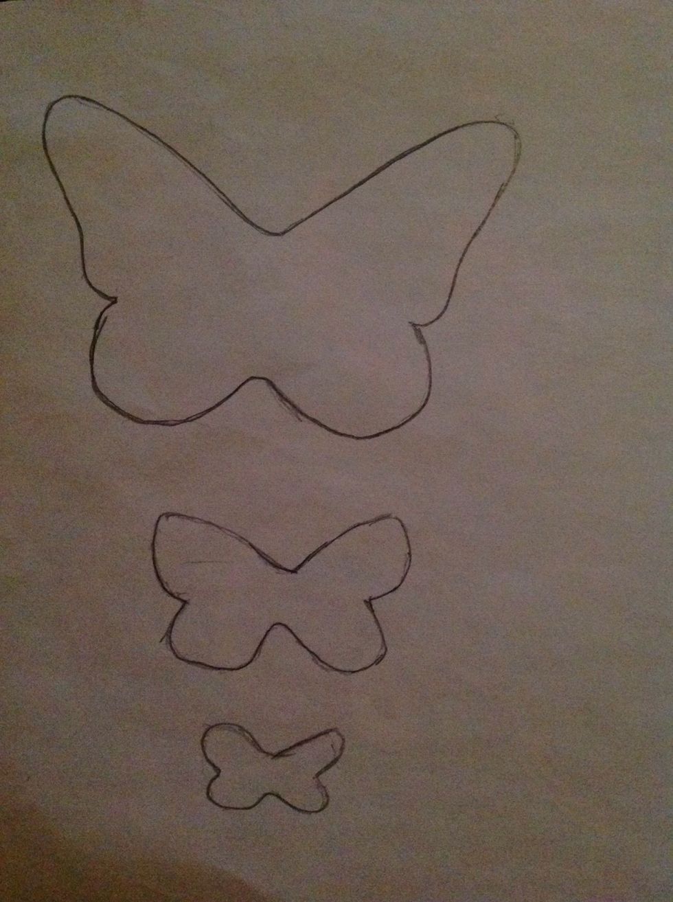 Trace the butterflies on your card stock. Trace the butterflies in different sizes to have a greater effect
