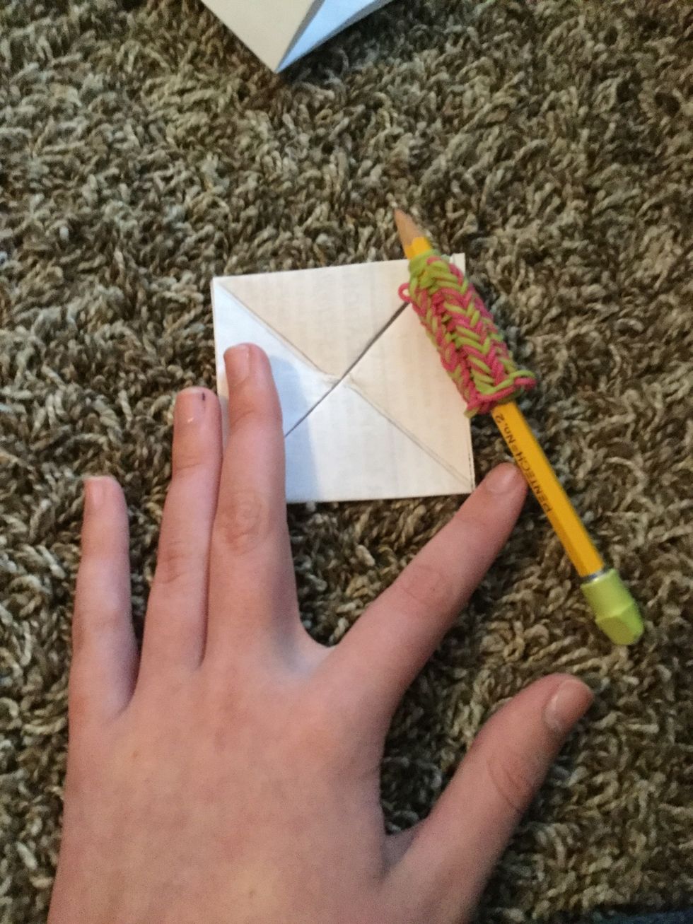 Trace the creases. Repeat for the other paper.