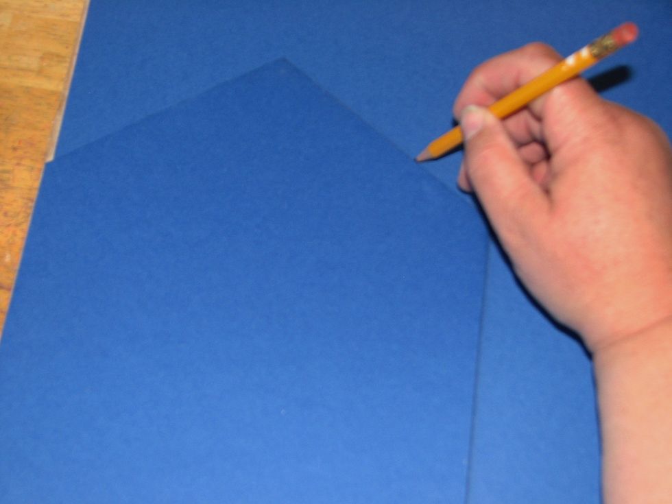 Trace the house shape onto a second sheet of cardstock - this will cover the inside of the album.