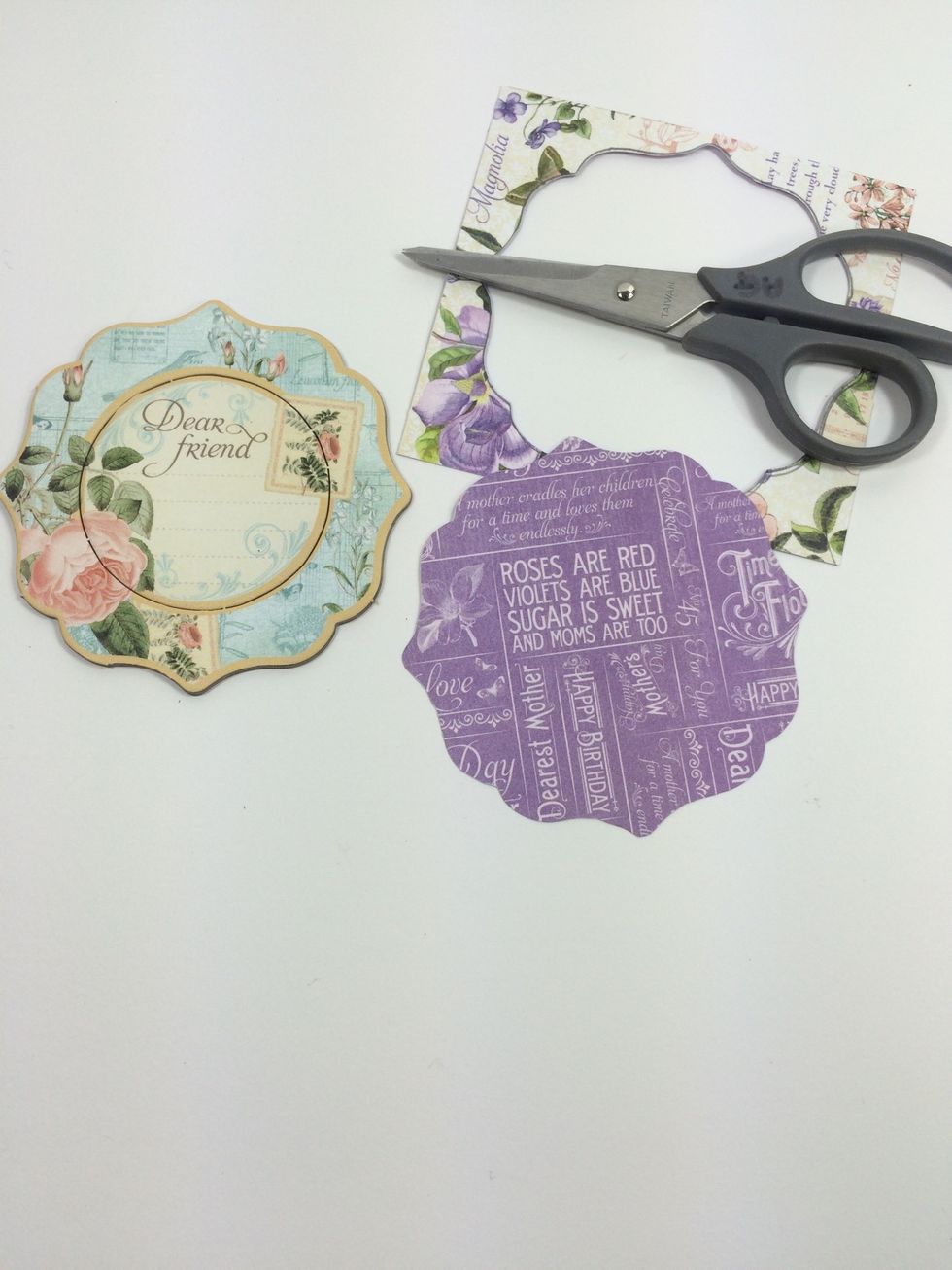 Trace the large chipboard piece onto the May Flourish Page. Cut out.