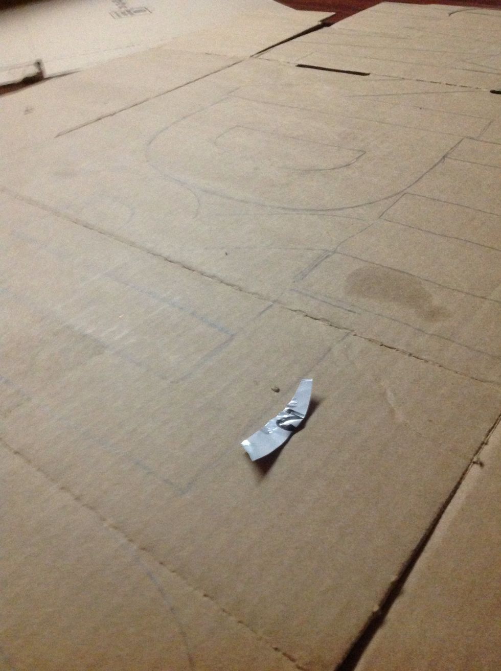 Trace the letters on the cardboard