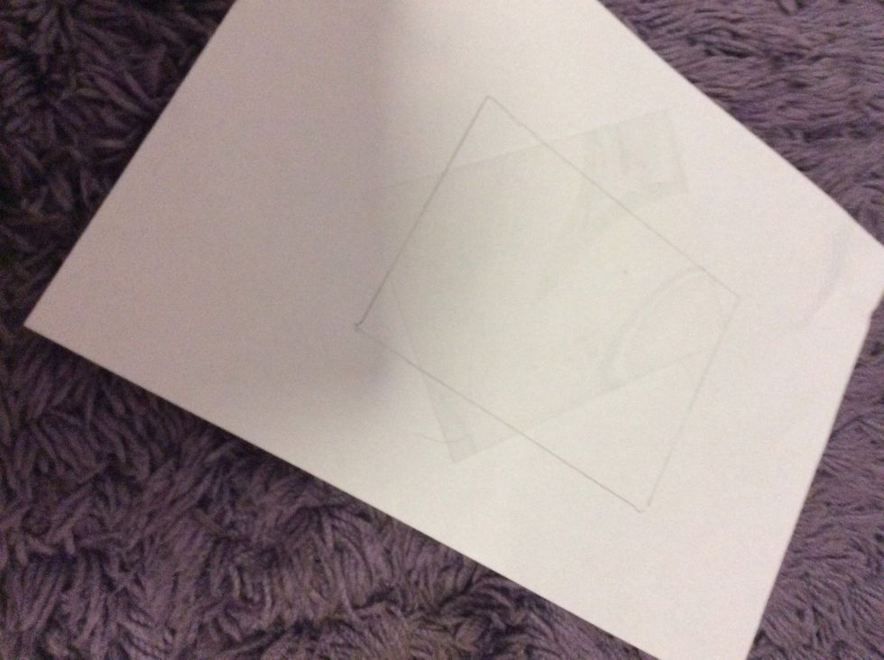 Trace the plastic/glass shape in your frame onto your choice of paper to determine what size the frame is.