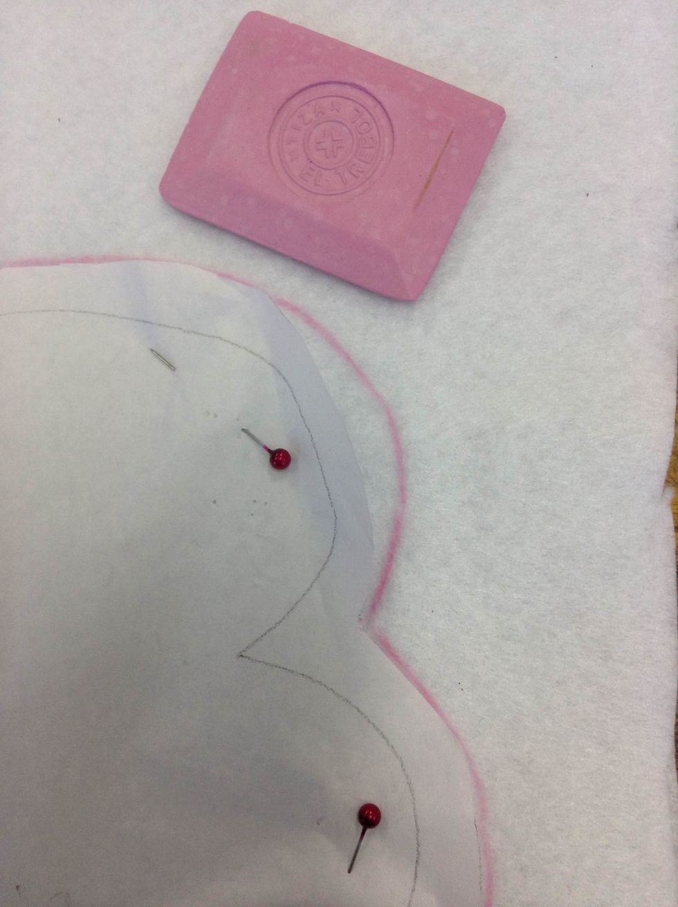 Trace the shape of the monster onto the felt with chalk.