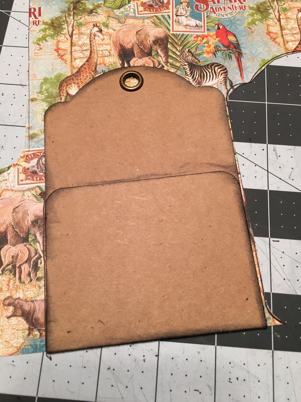 Trace the tags that have a folded pocket in the same manner, except you do not have to cut the paper the full length of the tag on the pocket side.