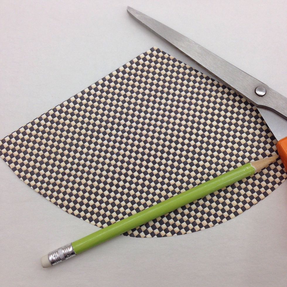 Trace the template on scrapbook paper. Cut out the roof.