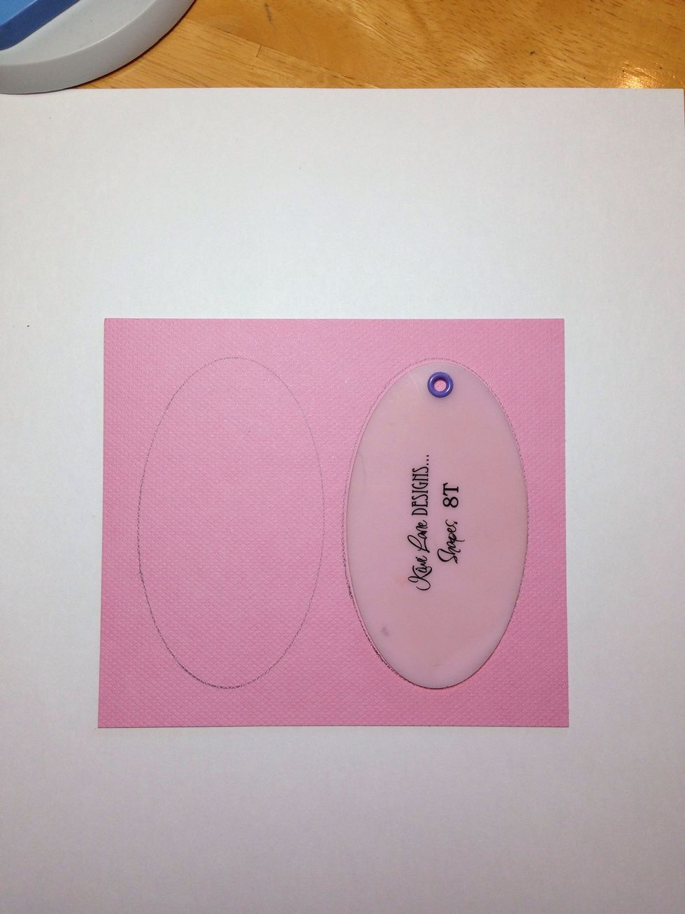 Trace two bunny ears using Kiwi Lane Tiny Shapes Template 8T.