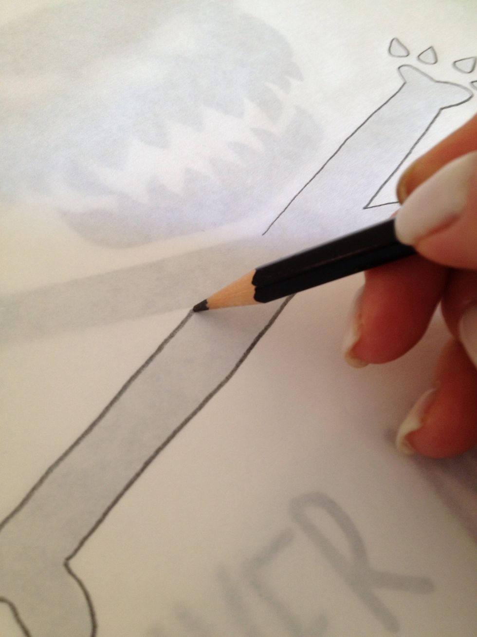 Trace with a slightly dull pencil. Use pressure to create a groove for cutting.