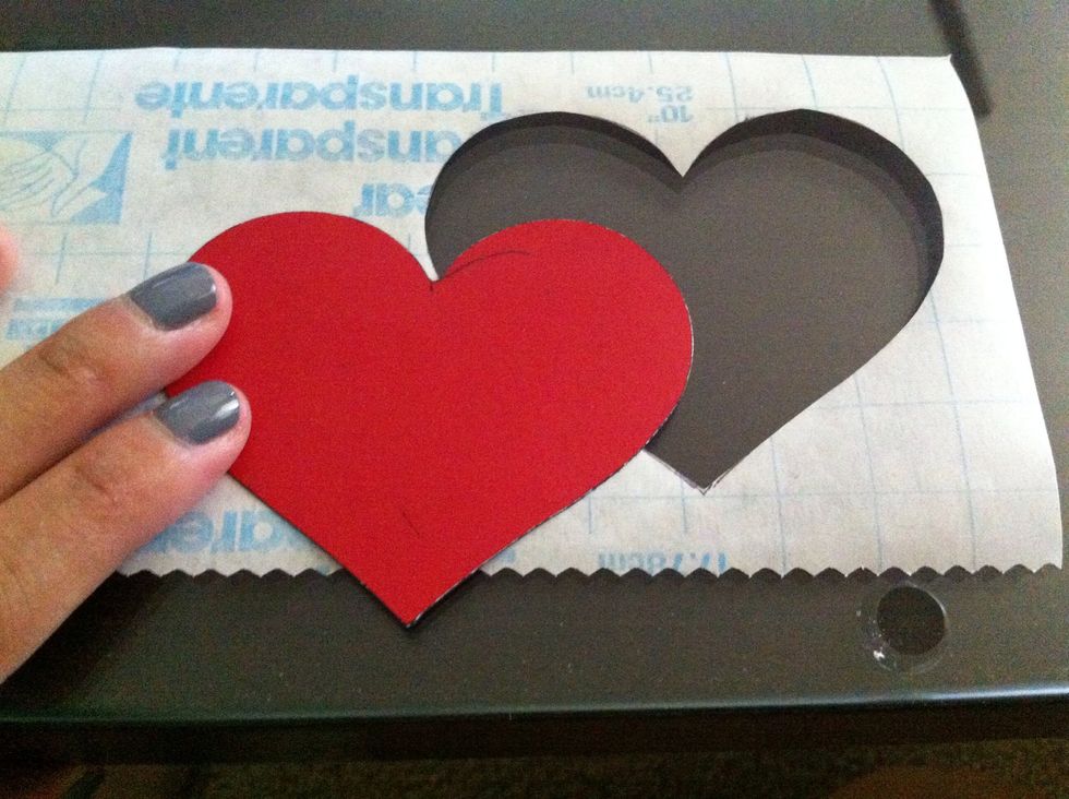 Trace your stencil onto a piece of contact paper and cut it out. Be sure to leave a border around the stencil.