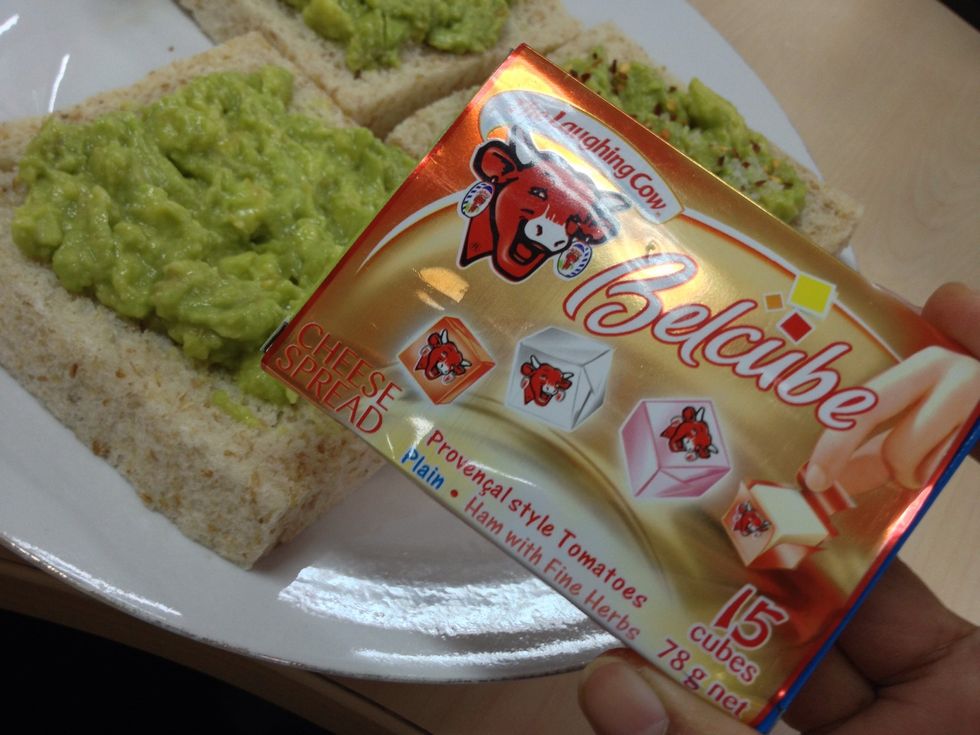 Traditional recipe calls for avocado-fresh tomato-cheese on top of a toast. But I use this kind of cheese lol same thing :) provencal style tomatoes. Open 2-3 cubes and crumb it on one of the slice