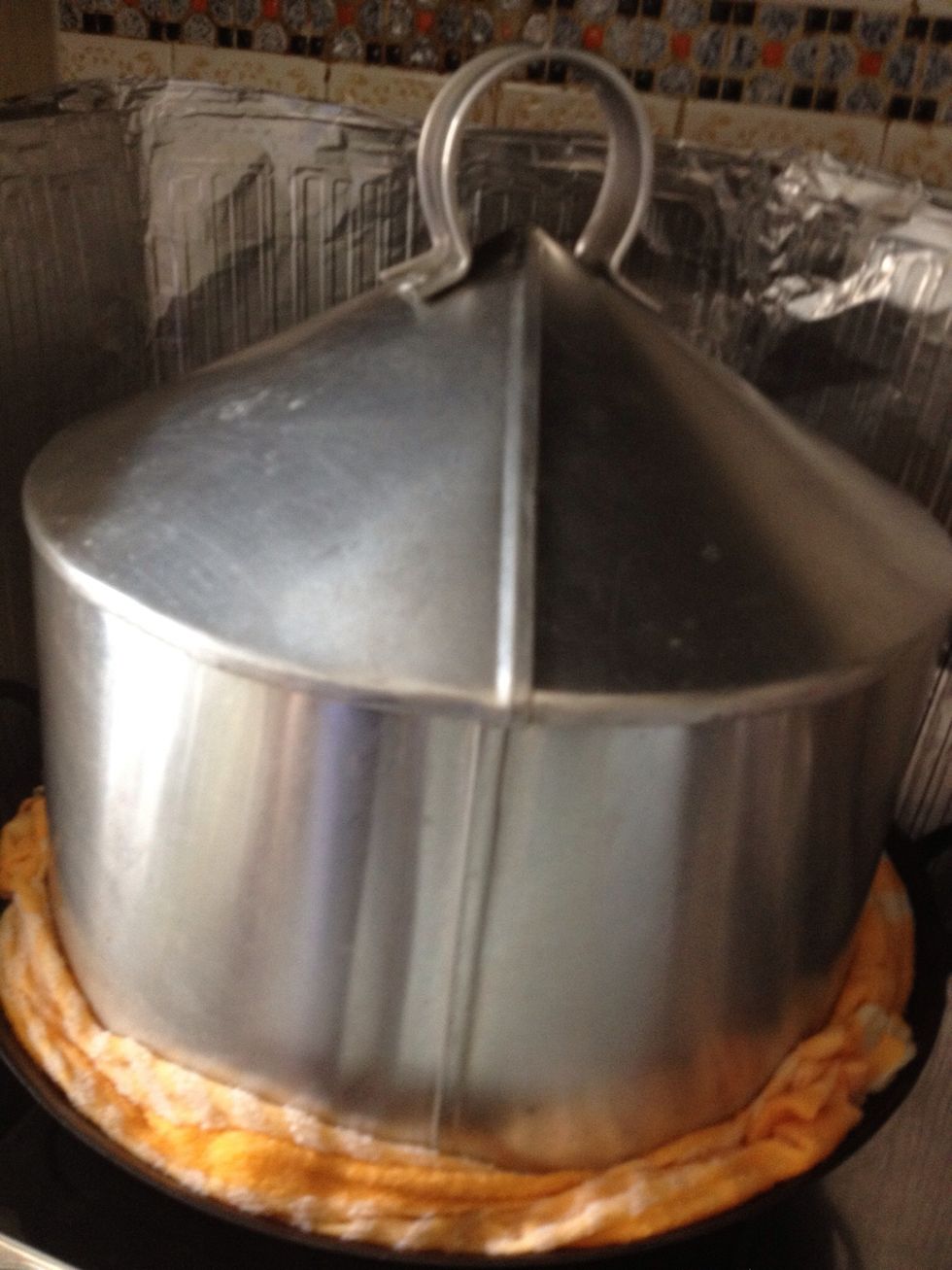 Traditional steamer - this can hold 2 pans simultaneously. Make sure the water level is below the pans. Check every half hourly adding water to prevent drying up. Steam for approximately 2 hours max.