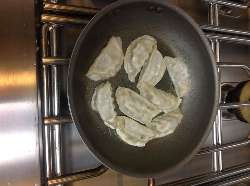 Traditionally dumplings are browned in a pan first.
