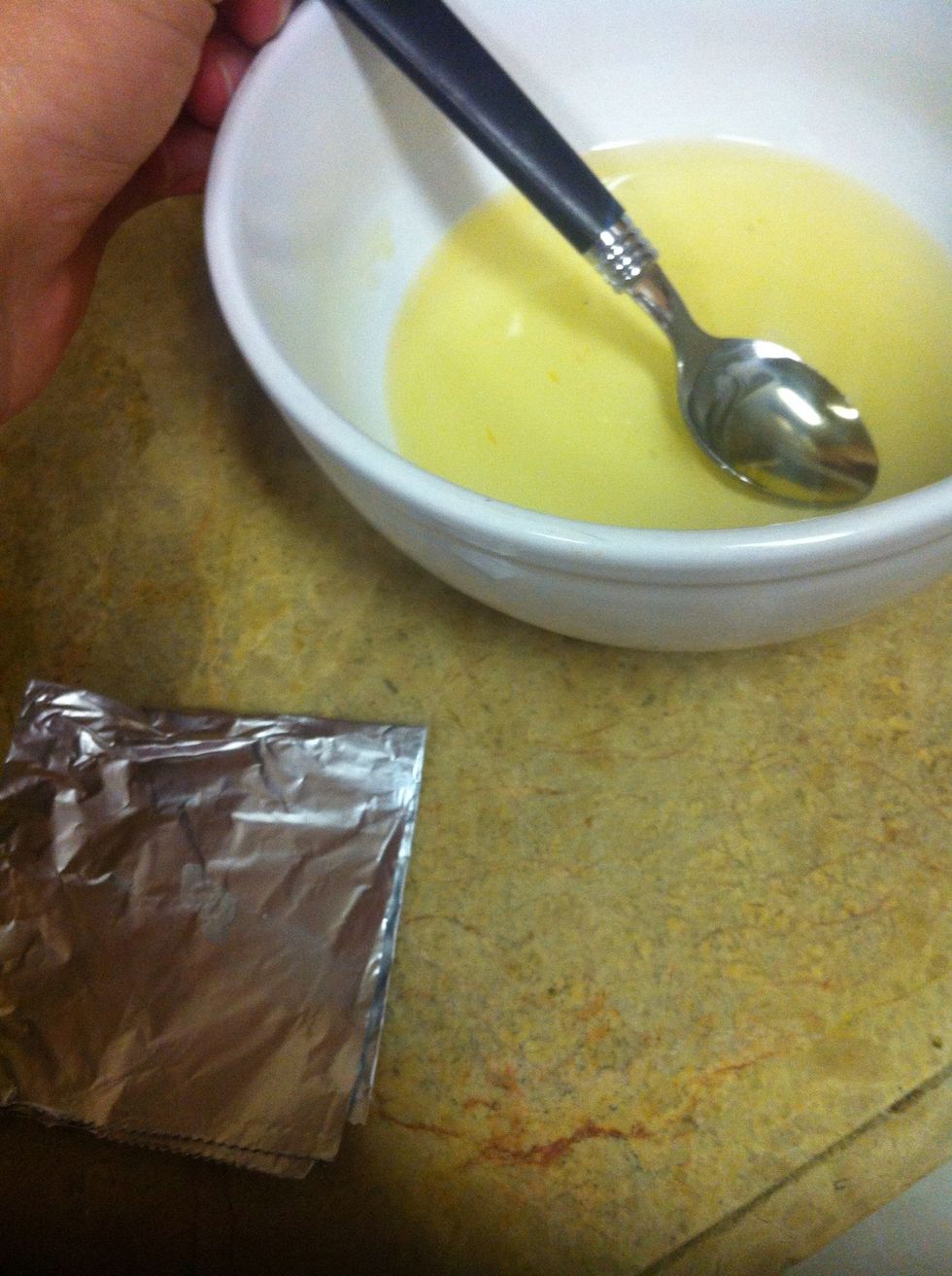 Transfer a little bit of the mixture to your square of aluminum foil....