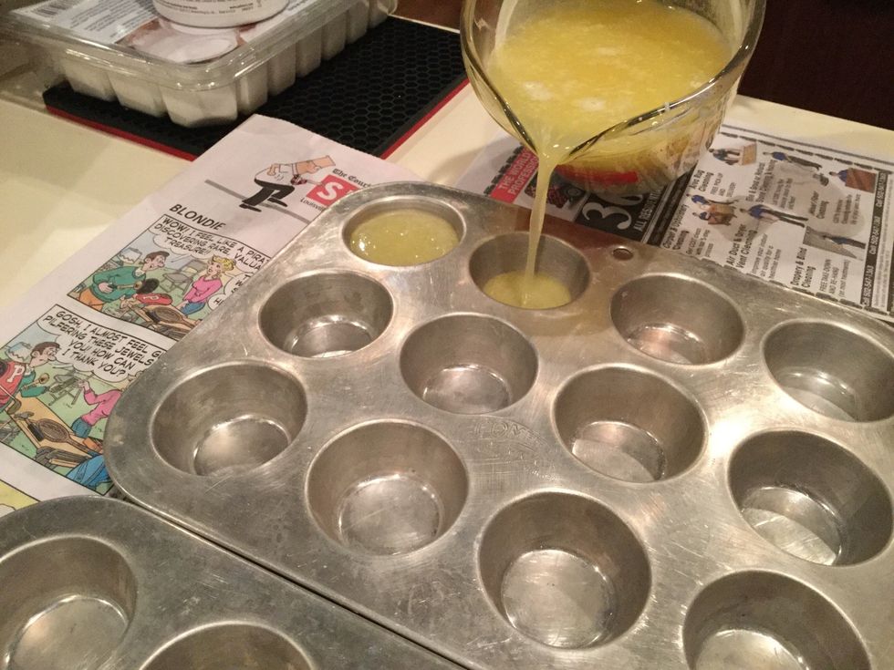 Transfer contents from the double boil into a cup with a lip, so it can be easier to transfer the contents into the muffin tins. After you transfer the liquid into a new cup, pour into a muffin tin.