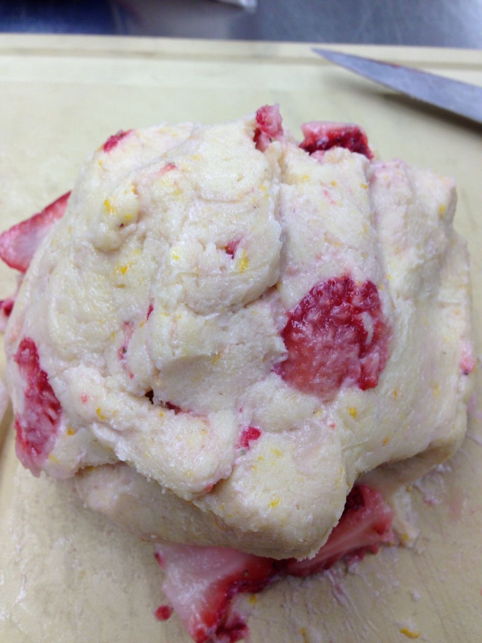 Transfer dough to a flat surface and roll out to 3/4 inch thickness.